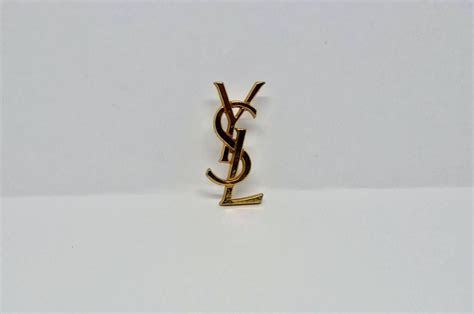 broche yves saint laurent prix|saint laurent brooch pins.